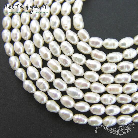 Жемчуг натуральный белый Baroque Rice 6-9 мм (нить 17 см)