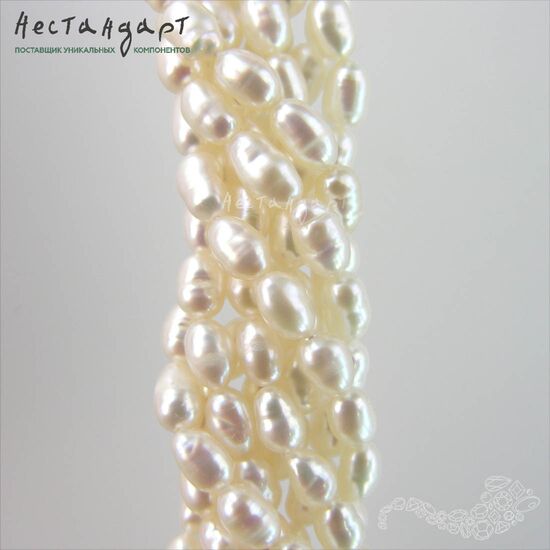 Жемчуг натуральный белый Baroque Rice 6-9 мм (нить 17 см), изображение 4